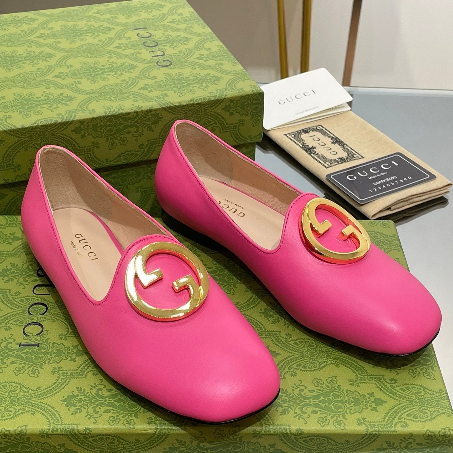 BLONDIE LOGO-PLAQUE LOAFERS IN BRIGHT PINK CALFSKIN WITH GOLD HARDWARE