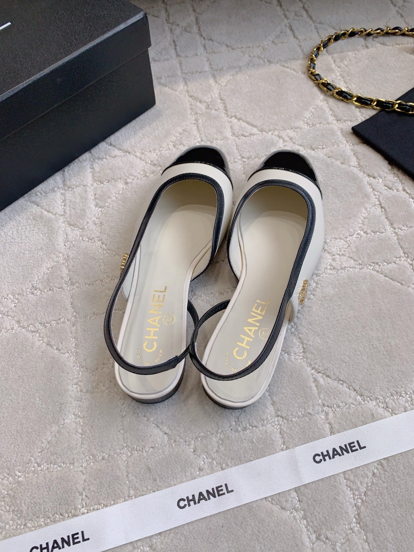 CHANEL 25S SLINGBACK IN BLACK AND WHITE CALFSKIN GOLD HARDWARE