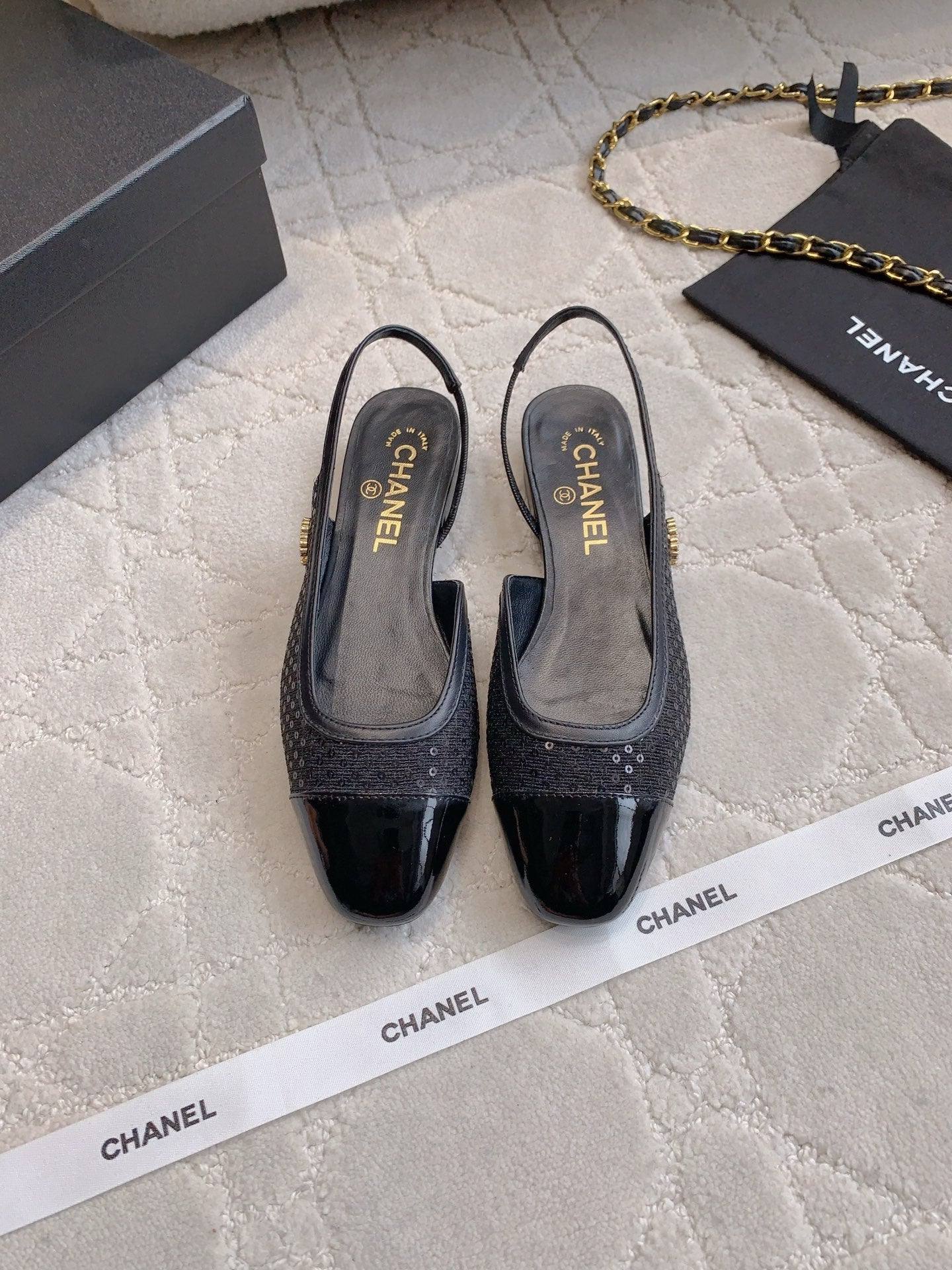 CHANEL 25S SLINGBACK IN SPARKLING BLACK CALFSKIN AND CANVAS GOLD HARDWARE