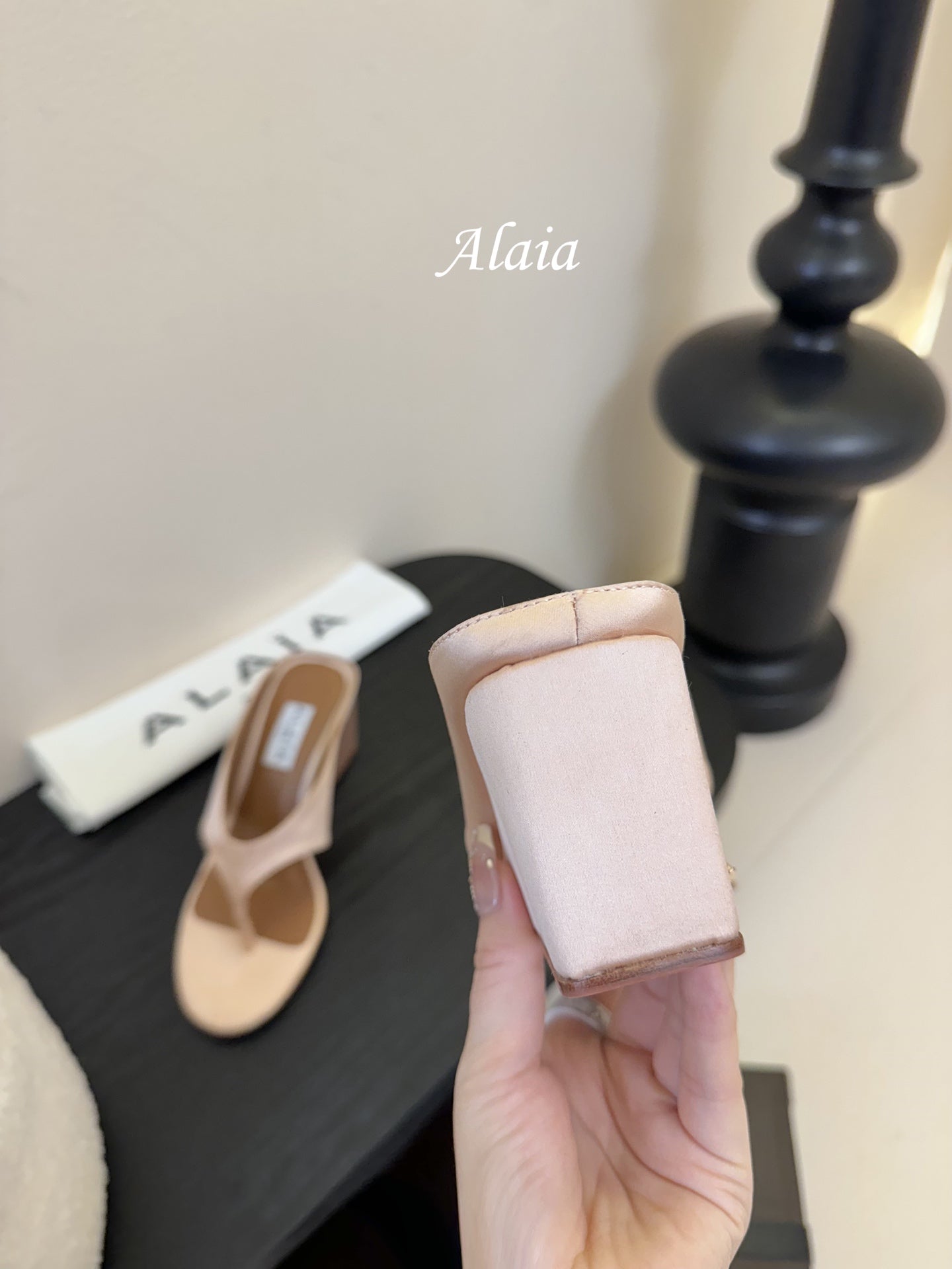 ALAIA WEDGE THONG SANDALS 25S IN BLUSH BEIGE SATIN