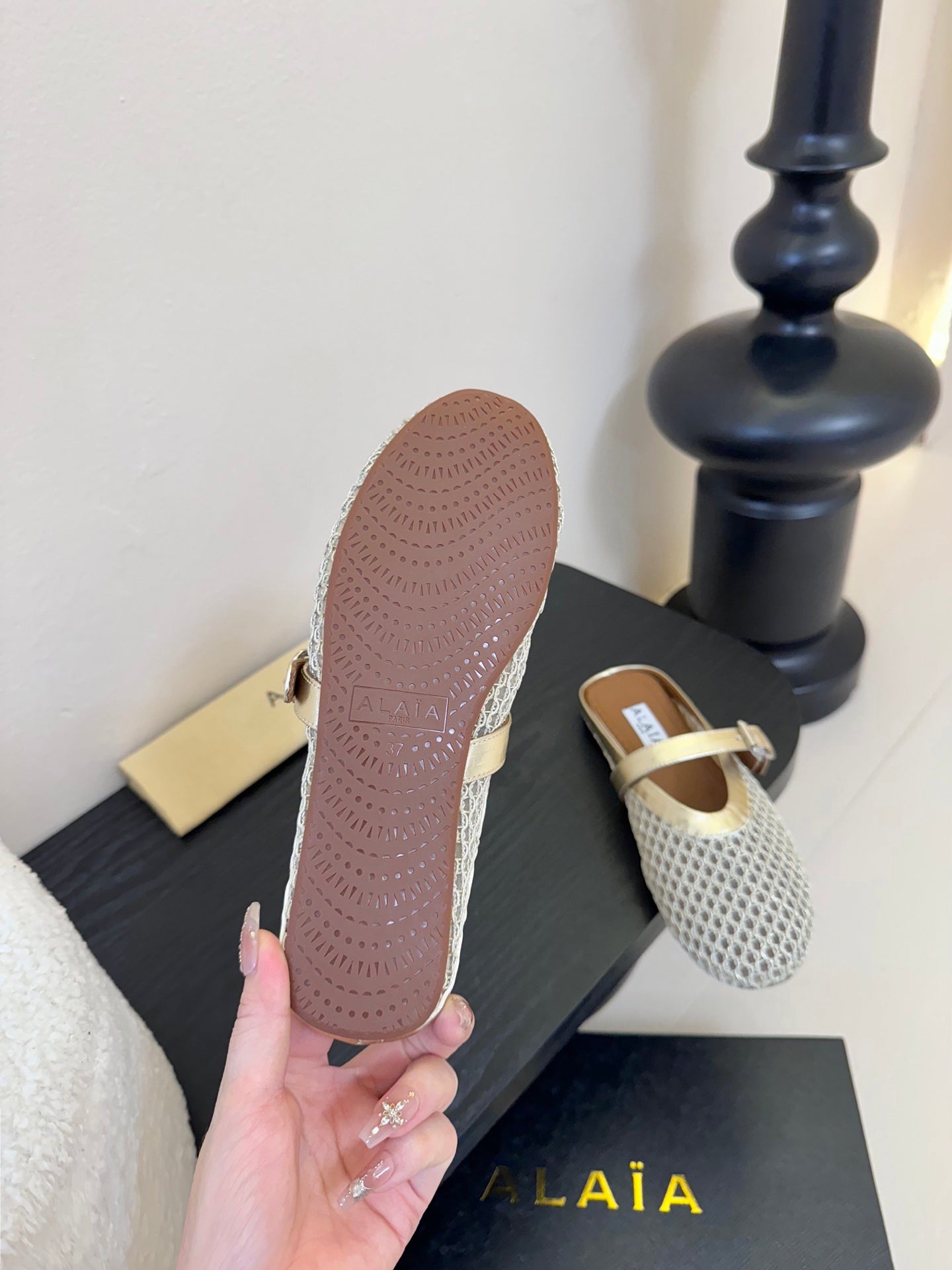 ALAIA FLAT MULES 25S IN GREY MIX GOLD WOVEN MESH