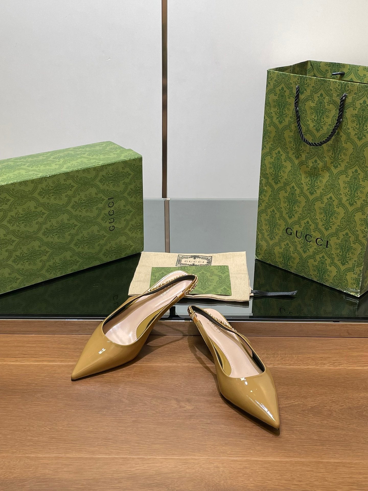 GG HIGH SLINGBACK 4.5 CM IN DIJON YELLOW GLOSSY CALFSKIN WITH GOLD HARDWARE