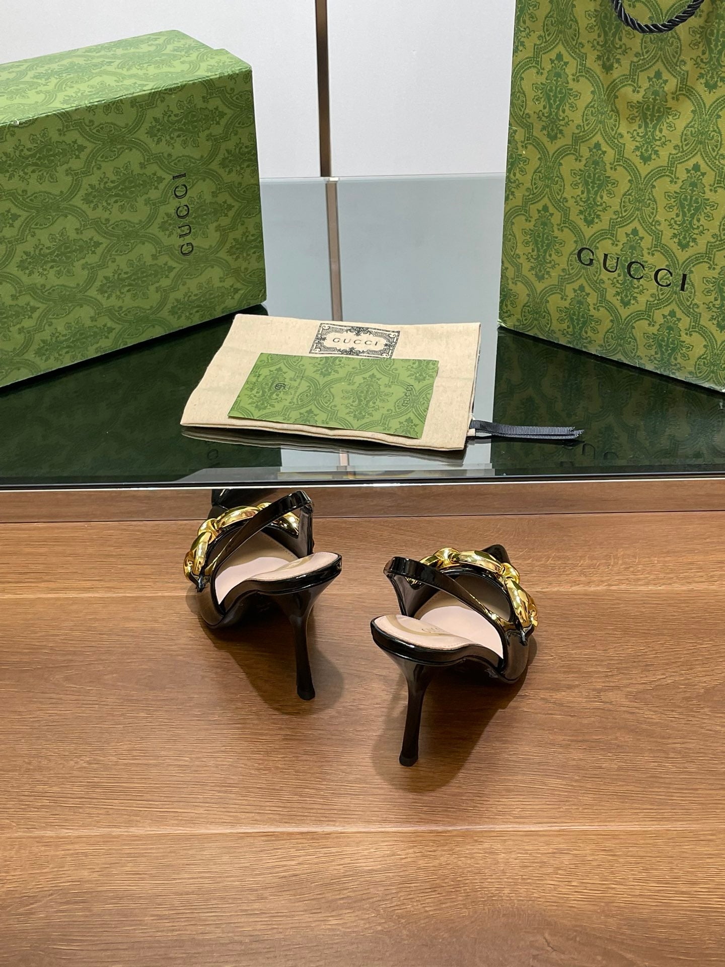 GG HIGH SLINGBACK 10.5 CM IN BLACK GLOSSY CALFSKIN WITH GOLD HARDWARE