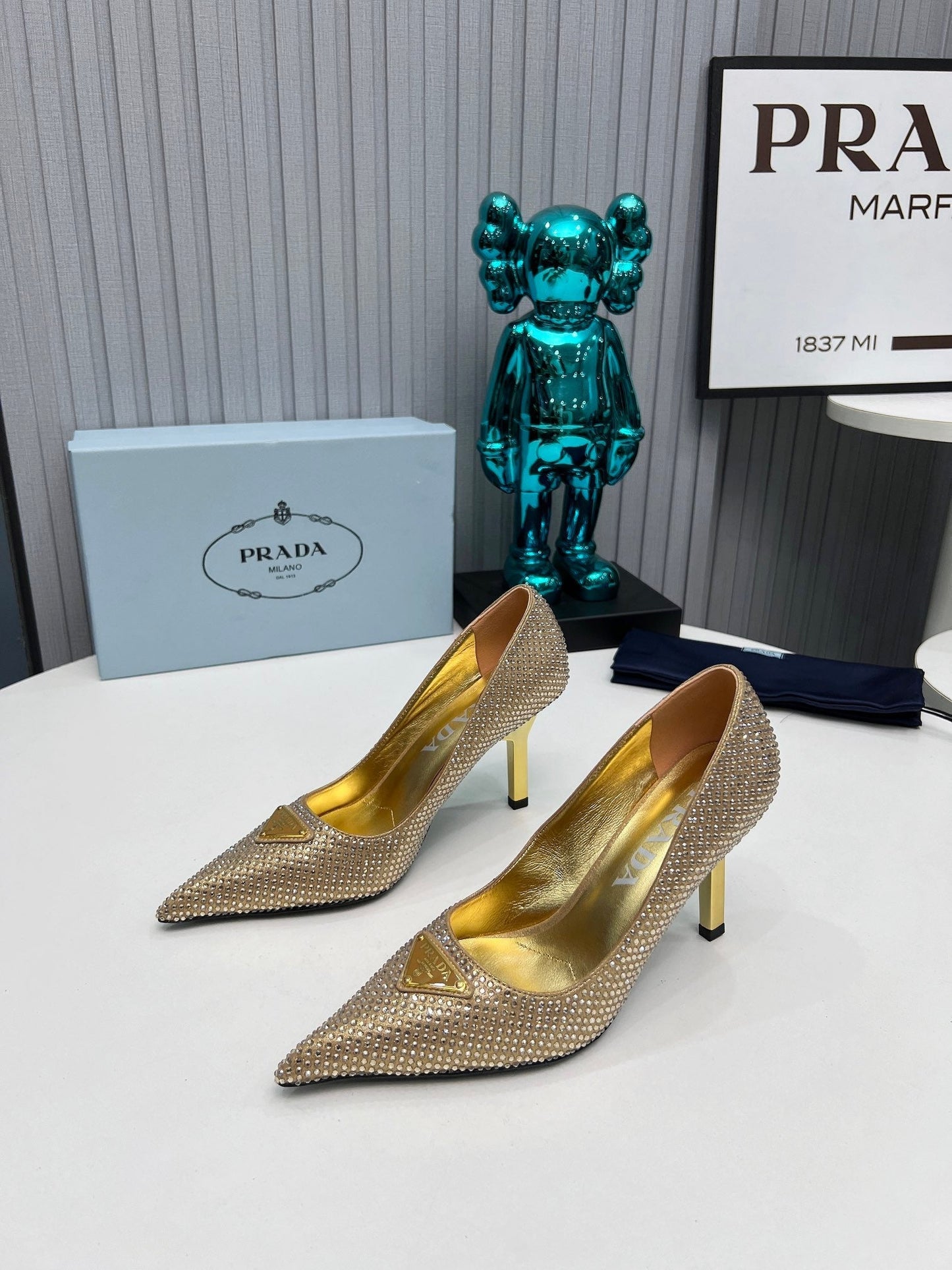 CRYSTAL HIGH-HEEL PUMPS IN GOLD SATIN WITH TRIANGLE LOGO