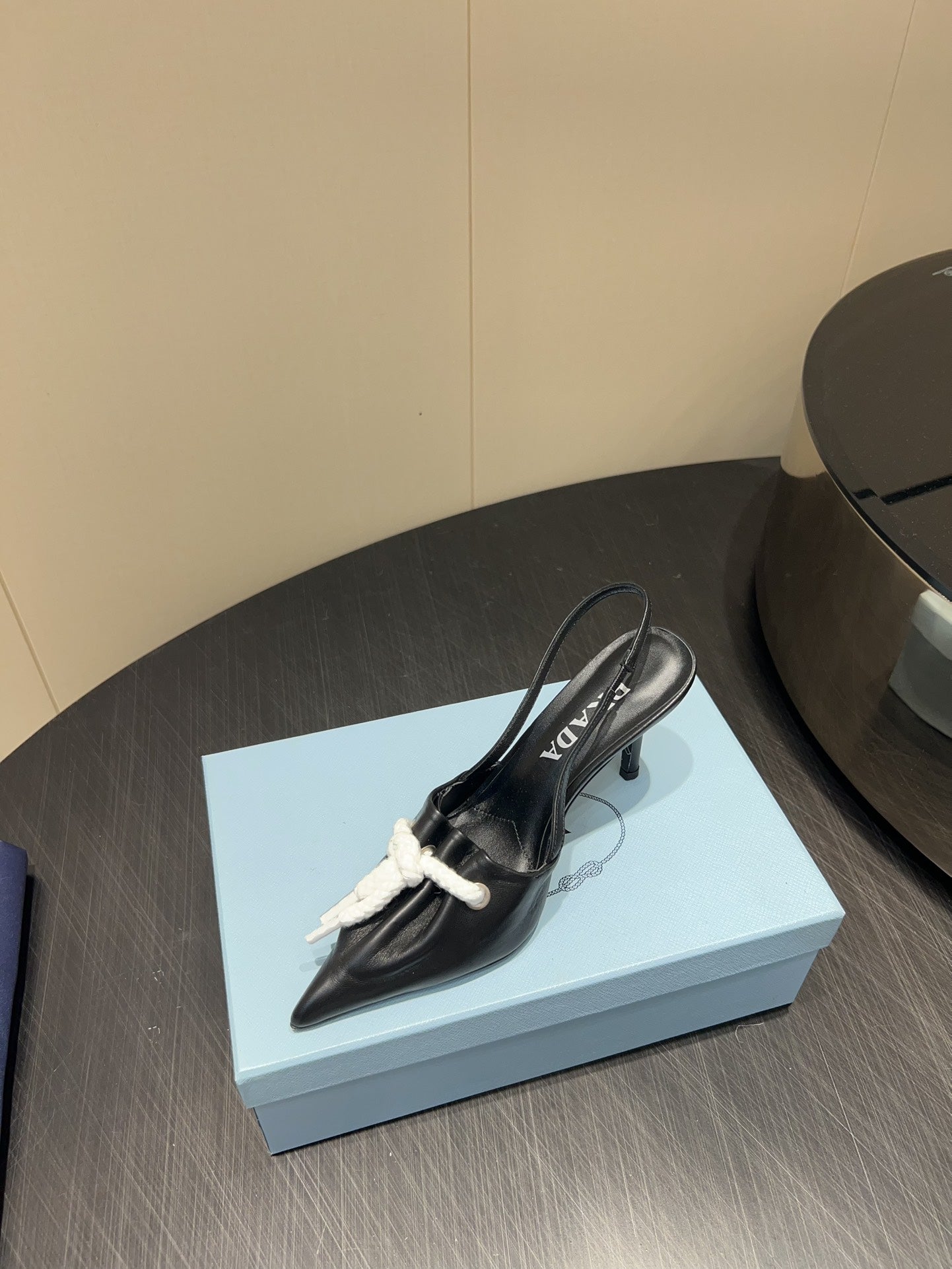 PRADA 25S POINTED TOE SLINGBACK 85MM IN BLACK LAMBSKIN WITH TIE UP DESIGN