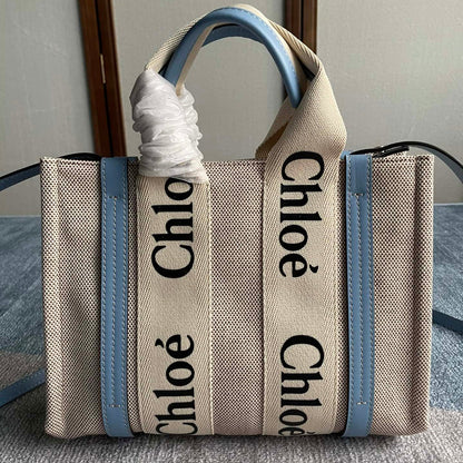 SMALL STRAP WOODY TOTE BAG 26.5 IN BEIGE LINEN CANVAS BLACK WEBBING LOGO EMBROIDER BLUE CALFSKIN