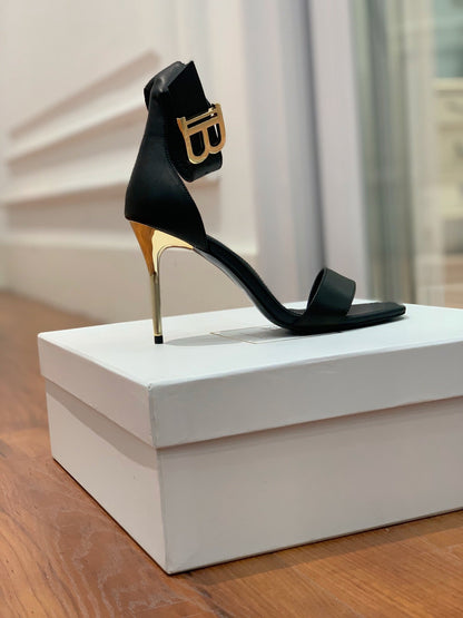 BALMAIN 25S THIN STRAP HIGH HEELS 105MM IN BLACK CALFSKIN GOLD HARDWARE