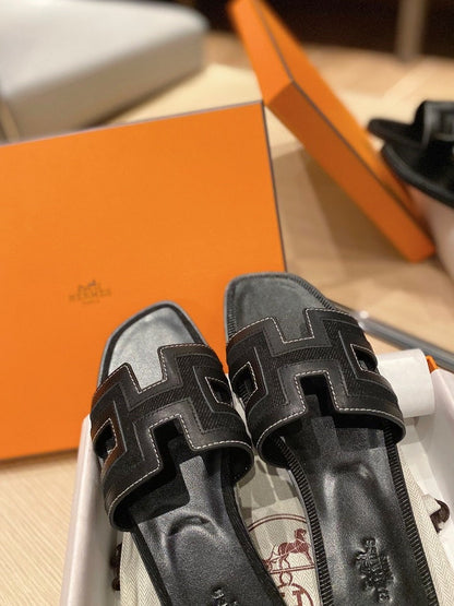 0RAN SANDALS IN BLACK CALFSKIN AND CANVAS