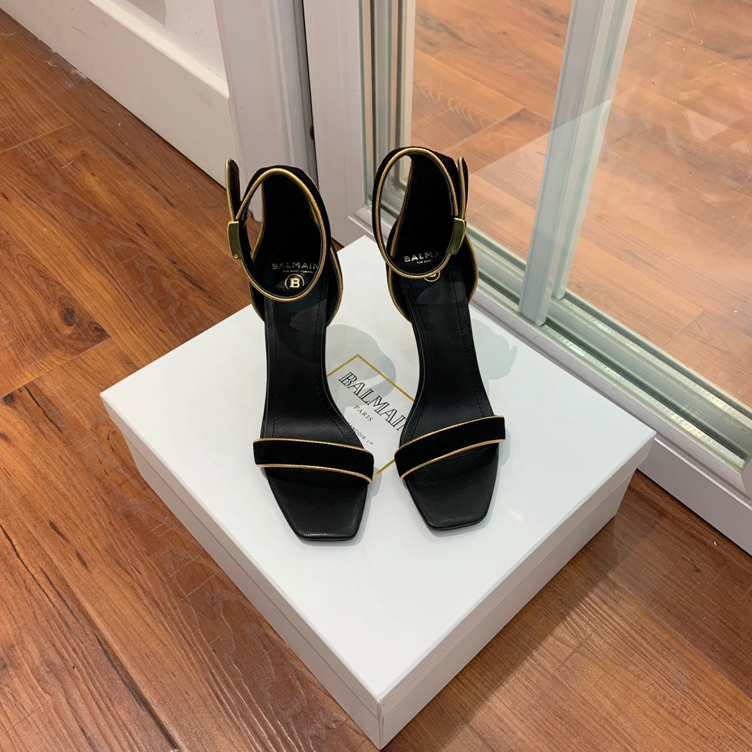 BALMAIN 25S UMA HEELED SANDALS 105MM IN BLACK SUEDE GOLD HARDWARE