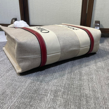 MEDIUM STRAP WOODY TOTE BAG 37 IN BEIGE LINEN CANVAS BLACK WEBBING LOGO EMBROIDER RED CALFSKIN