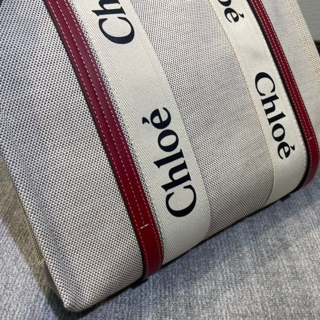 MEDIUM STRAP WOODY TOTE BAG 37 IN BEIGE LINEN CANVAS BLACK WEBBING LOGO EMBROIDER RED CALFSKIN