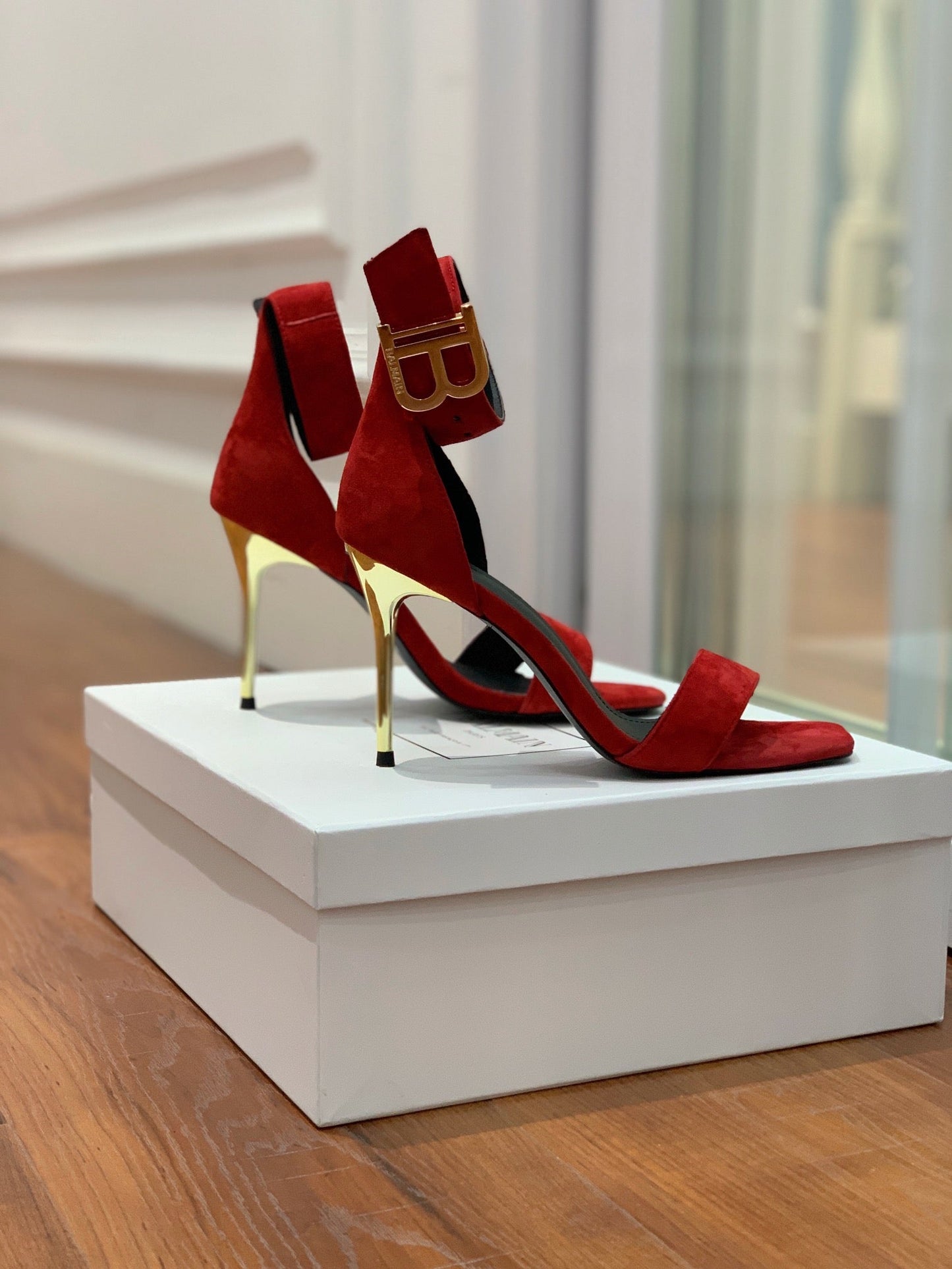 BALMAIN 25S THIN STRAP HIGH HEELS 105MM IN DARK RED SUEDE GOLD HARDWARE