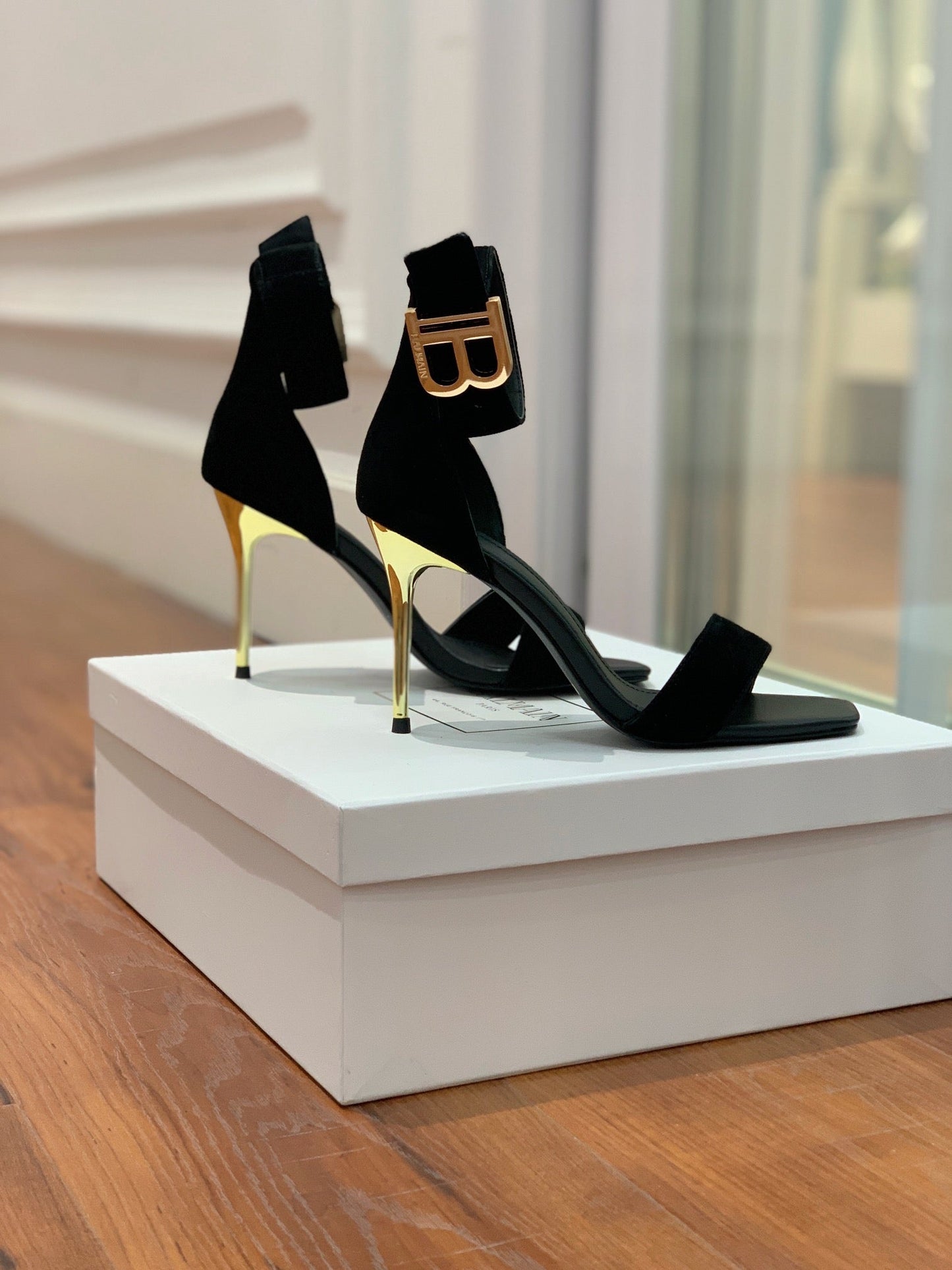 BALMAIN 25S THIN STRAP HIGH HEELS 105MM IN BLACK SUEDE GOLD HARDWARE