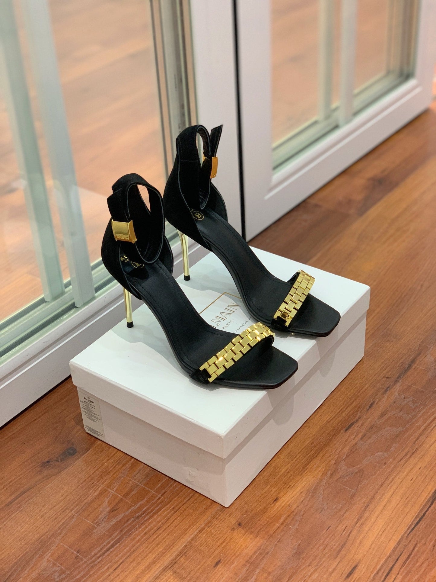 BALMAIN 25S METAL STRAP HIGH HEELS 95MM IN BLACK SUEDE GOLD HARDWARE