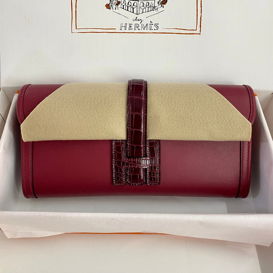 JIGE ELAN 29 CLUTCH IN CHERRY RED CALFSKIN WITH WINE RED LIZARD SKIN