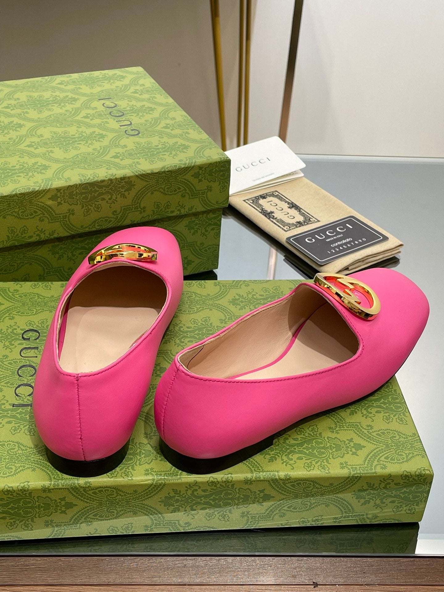 BLONDIE LOGO-PLAQUE LOAFERS IN BRIGHT PINK CALFSKIN WITH GOLD HARDWARE
