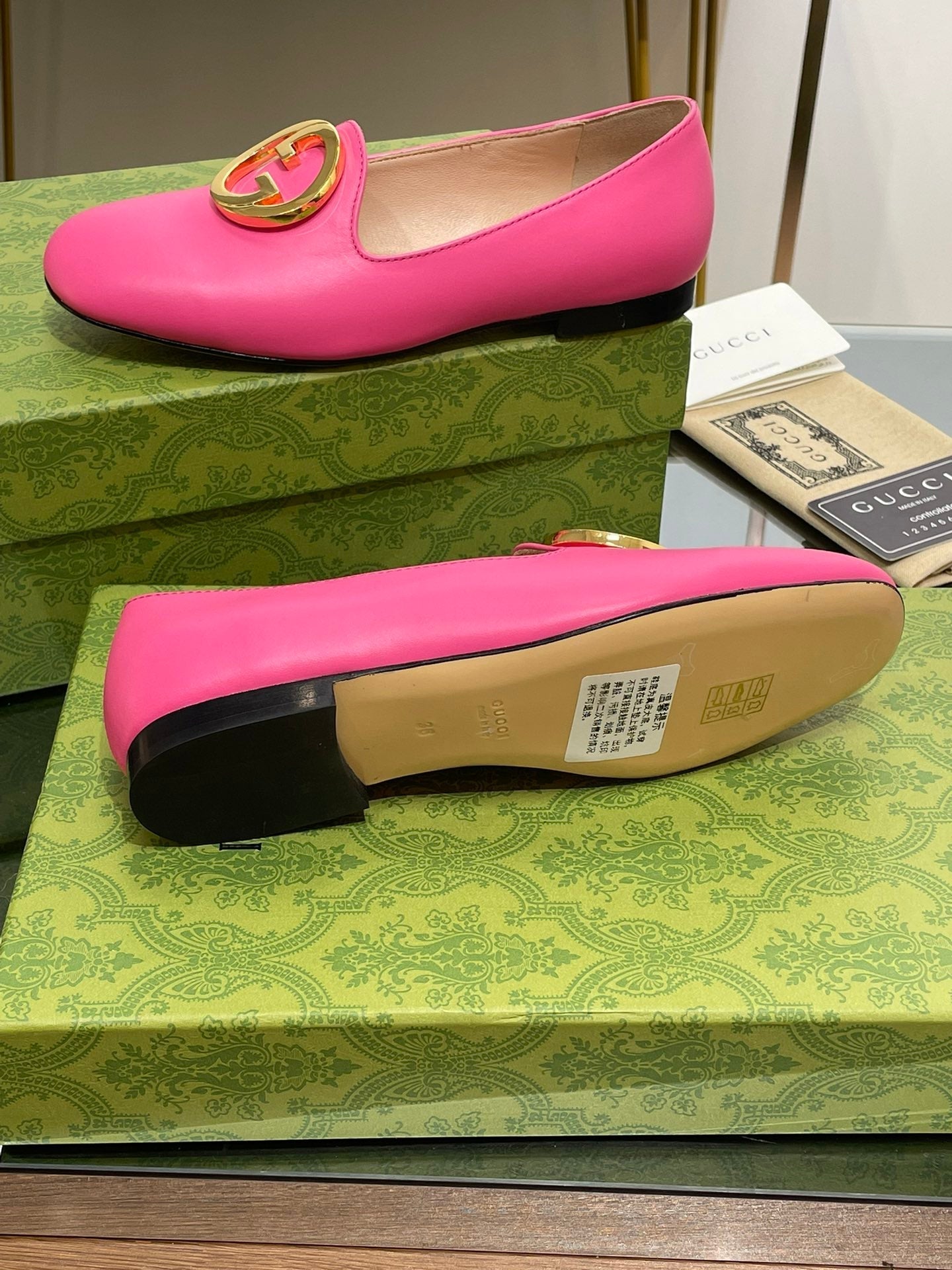 BLONDIE LOGO-PLAQUE LOAFERS IN BRIGHT PINK CALFSKIN WITH GOLD HARDWARE