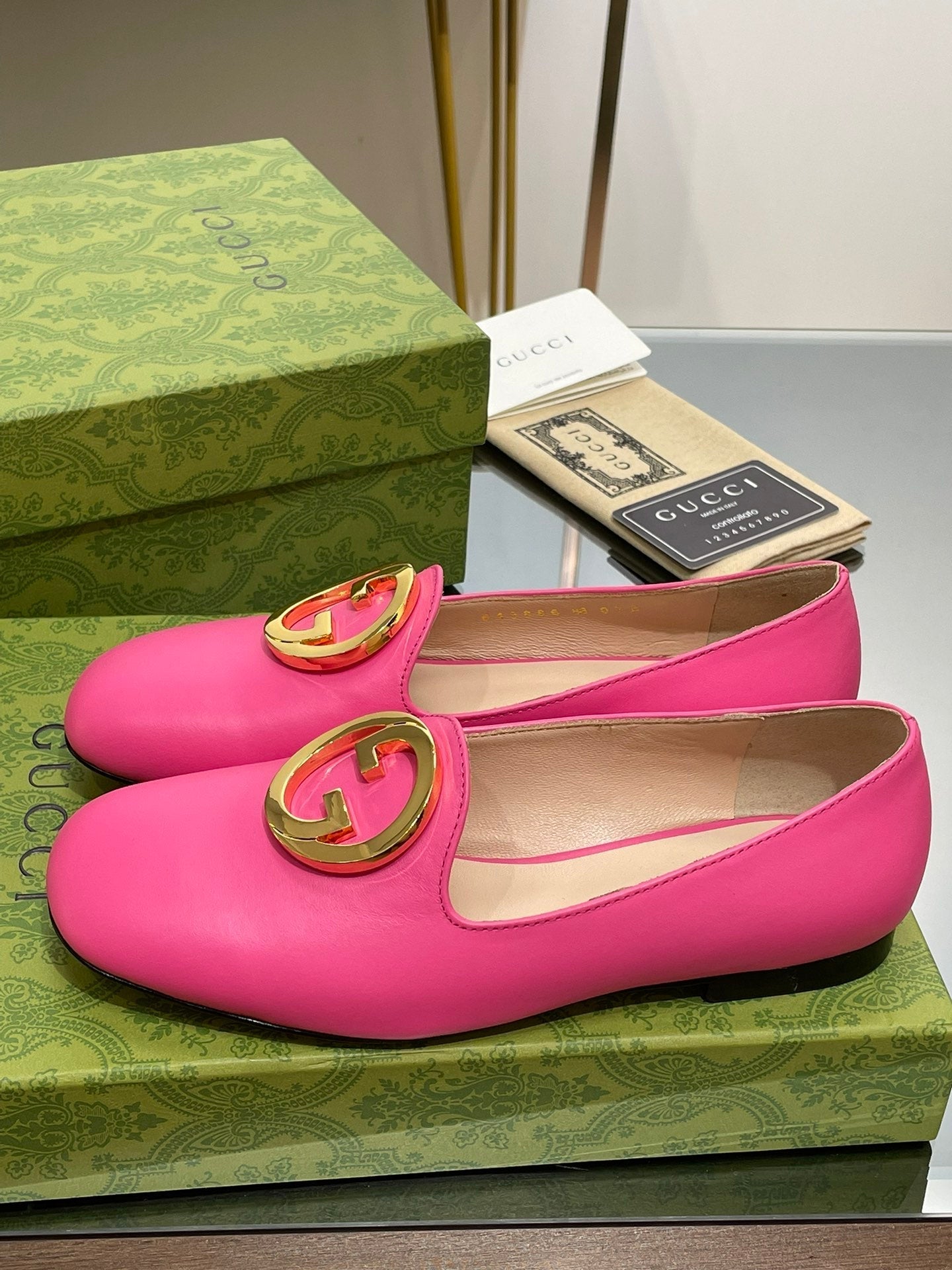 BLONDIE LOGO-PLAQUE LOAFERS IN BRIGHT PINK CALFSKIN WITH GOLD HARDWARE