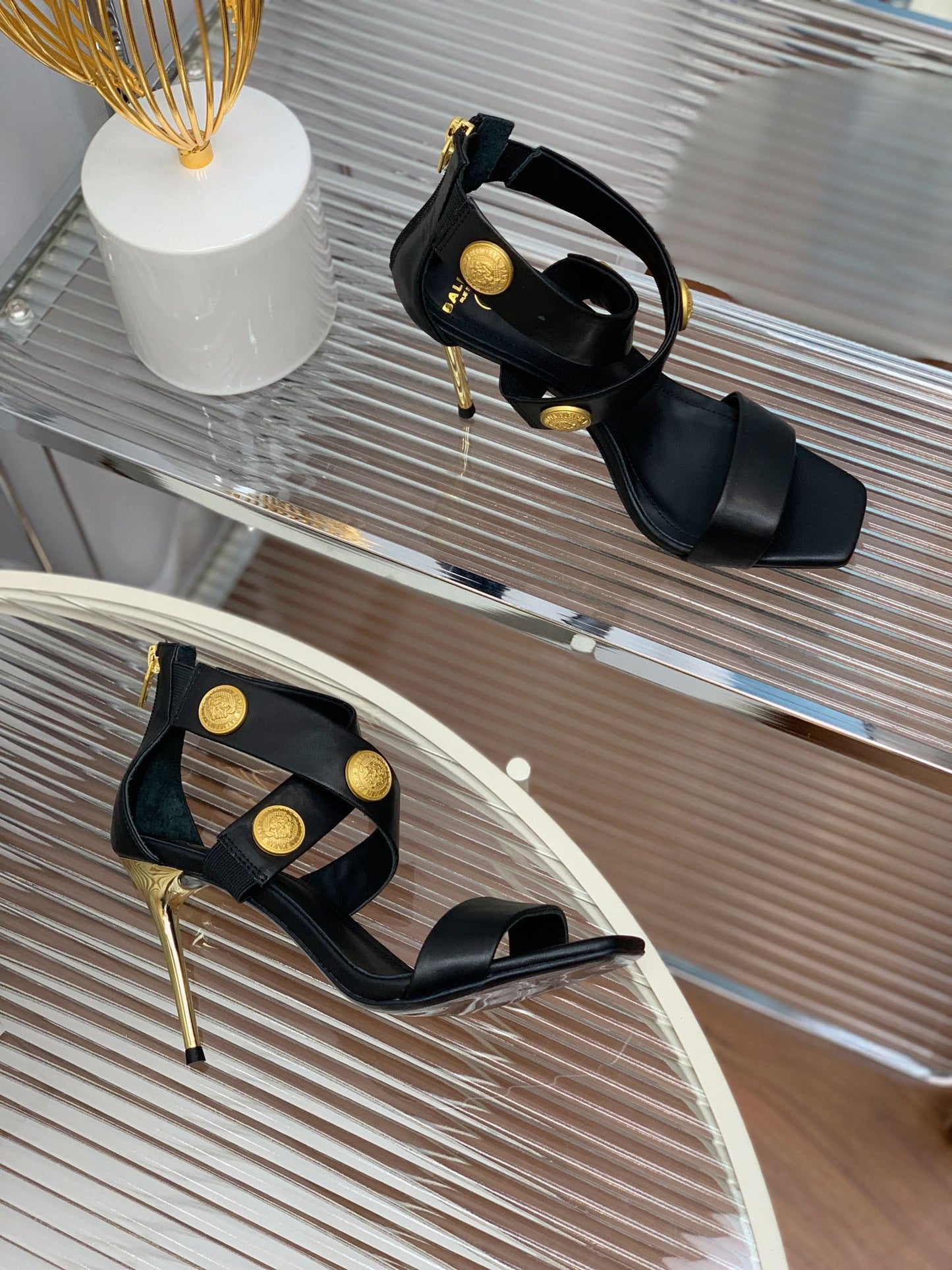 BALMAIN 25S CROSSOVER STRAP HIGH HEELS 95MM IN BLACK CALFSKIN