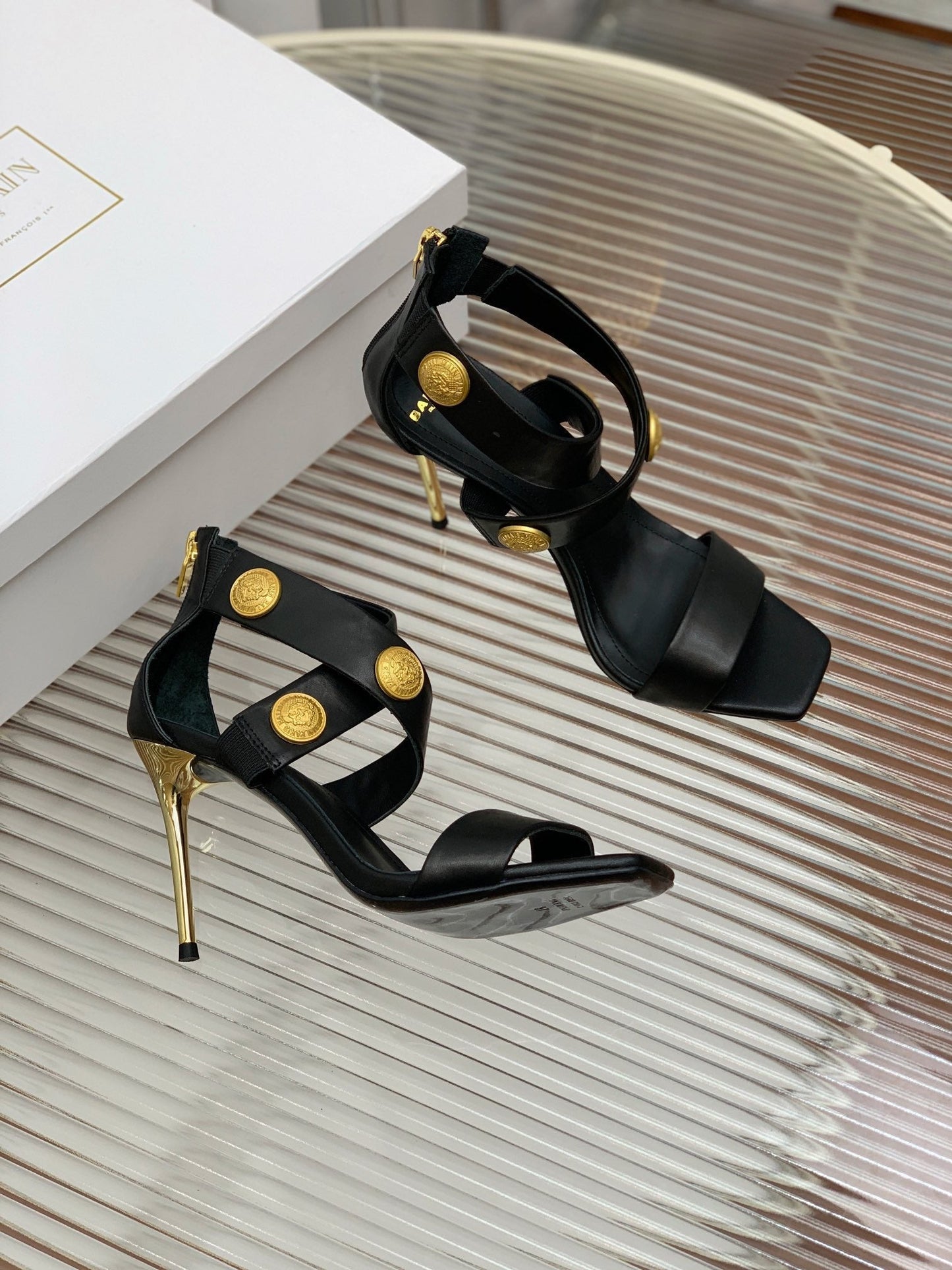 BALMAIN 25S CROSSOVER STRAP HIGH HEELS 95MM IN BLACK CALFSKIN