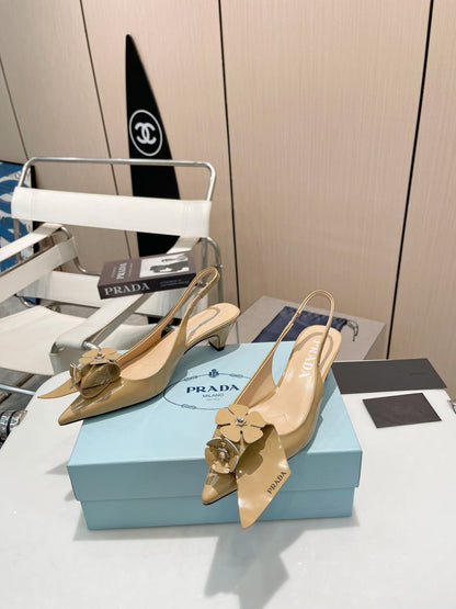 SLINGBACK KITTEN HEEL IN TORTILLA BROWN SHINY CALFSKIN ATTACHED FLOWERS