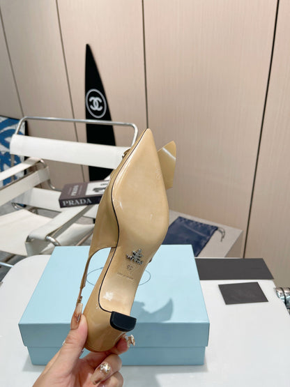 SLINGBACK KITTEN HEEL IN TORTILLA BROWN SHINY CALFSKIN ATTACHED FLOWERS