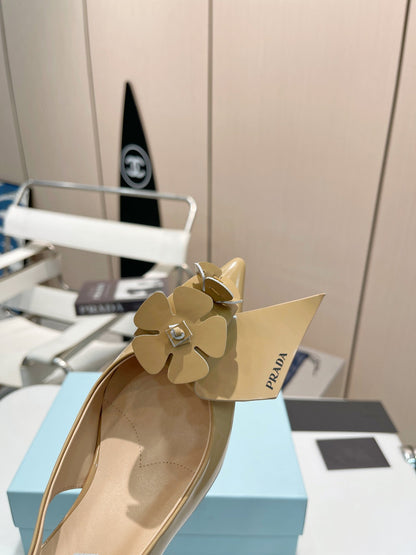 SLINGBACK KITTEN HEEL IN TORTILLA BROWN SHINY CALFSKIN ATTACHED FLOWERS