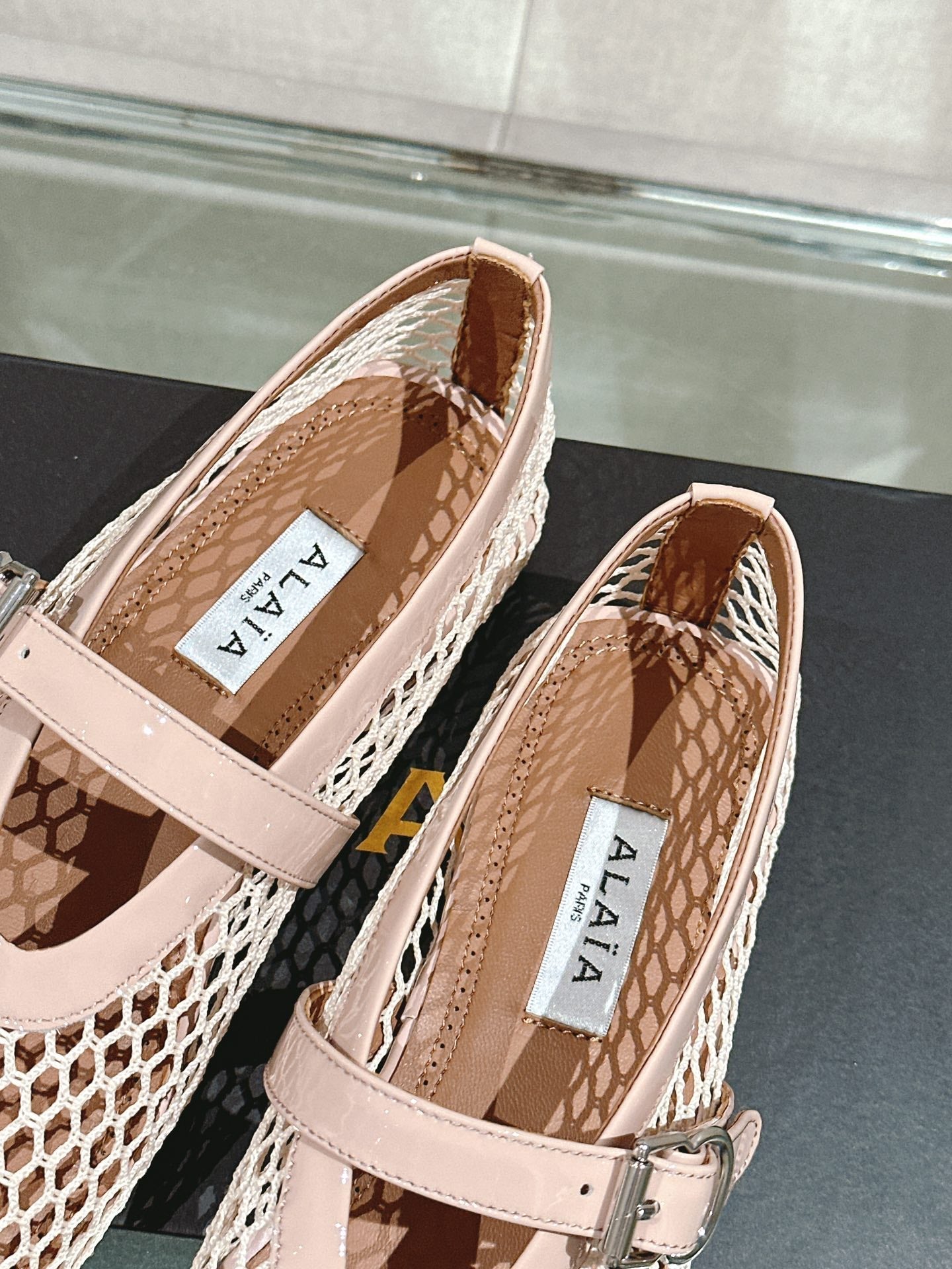 ALAIA BALLET FLATS IN NUDE BEIGE MESH