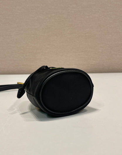 MINI BUCKET BAG 10 IN BLACK RE-NYLON AND SAFFIANO LEATHER STRAP