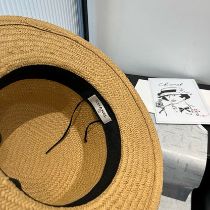 FLAT STRAW HAT BROWN FLOWER ATTACHMENT 673930