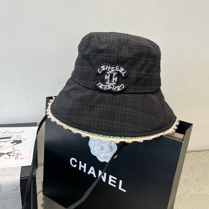 BLACK BUCKET HAT WITH FLORAL BORDER 673996