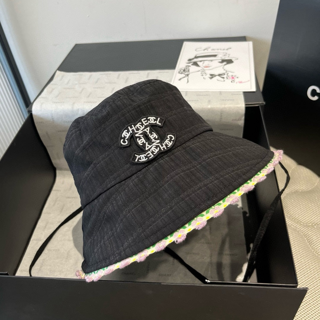 BLACK BUCKET HAT WITH FLORAL BORDER 673996