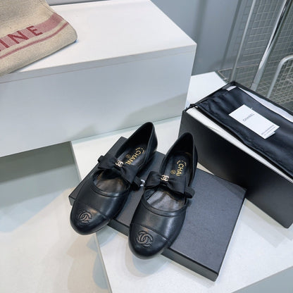 CHANEL FLAT MARY JANE SHOES 25S IN BLACK LAMBSKIN EMBOSSED LOGO WITH BOW