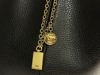 Chlo Spin tote bag in black grained leather