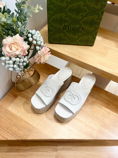 HIGH 10CM WEDGE SANDALS IN WHITE SHEEPSKIN