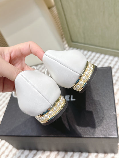 CHANEL 25S MARY JANE BALLET FLATS IN WHITE LAMBSKIN BLACK PATENT CAP TOE WITH BOW