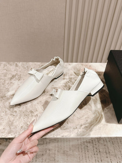 CC FLATS 25S IN WHITE PATENT LEATHER