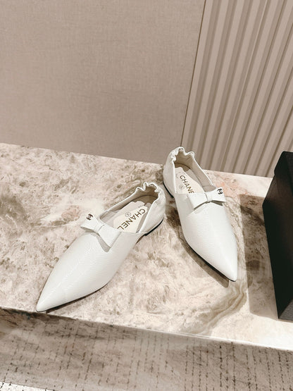 CC FLATS 25S IN WHITE PATENT LEATHER