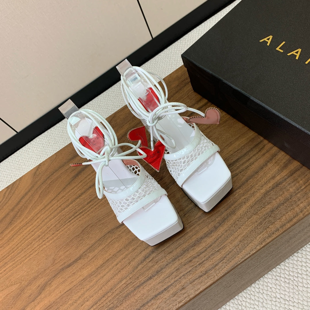 ALAIA BANQUET WEDGE SANDALS IN WHITE LAMBSKIN WITH RED HEART