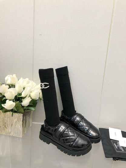 CHUNKY PLATFORM SHEARLING SLIPPER BLACK LAMBSKIN