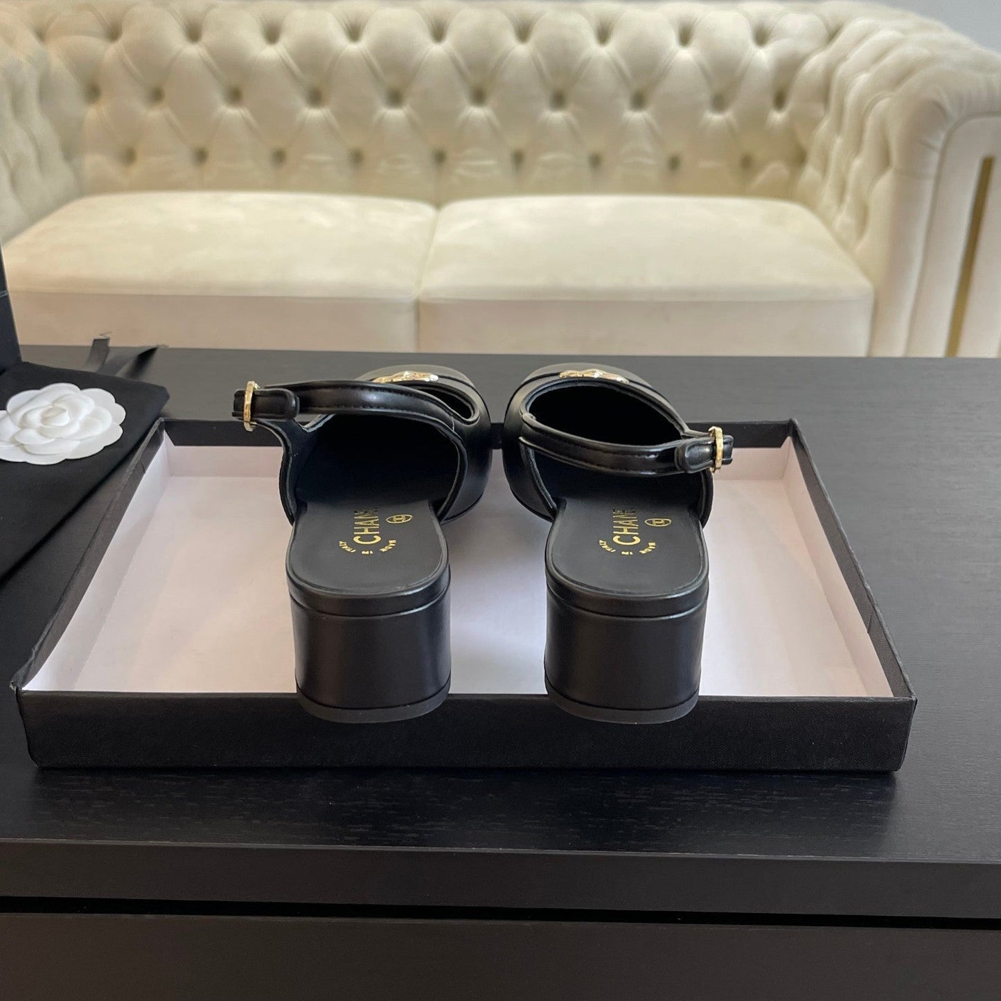 CC SLINGBACKS IN BLACK CALFSKIN