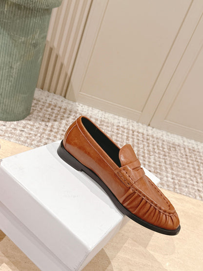 YSL 25S SAINT LAURENT LOAFERS IN BURNT ORANGE CALFSKIN WITH SMALL LOGO