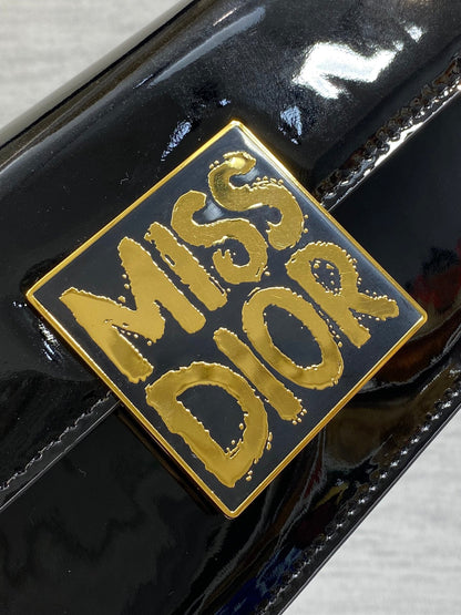 FLAP BAG 18 IN BLACK PATENT CALFSKIN