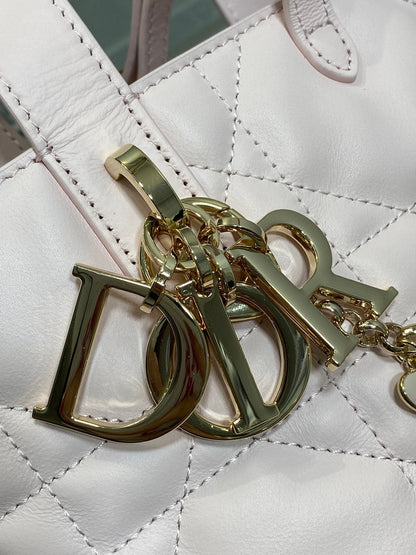 DIOR 25S TOUJOURS VERTICAL TOTE BAG 18 IN LIGHT PINK CALFSKIN WITH CHARM BRACELET STRAP
