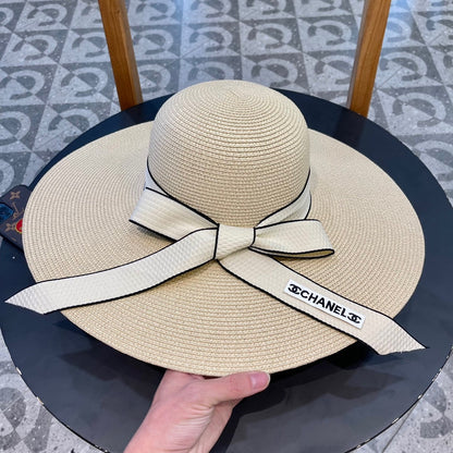 WIDE BRIM STRAW HAT WITH BOW BEIGE 672706
