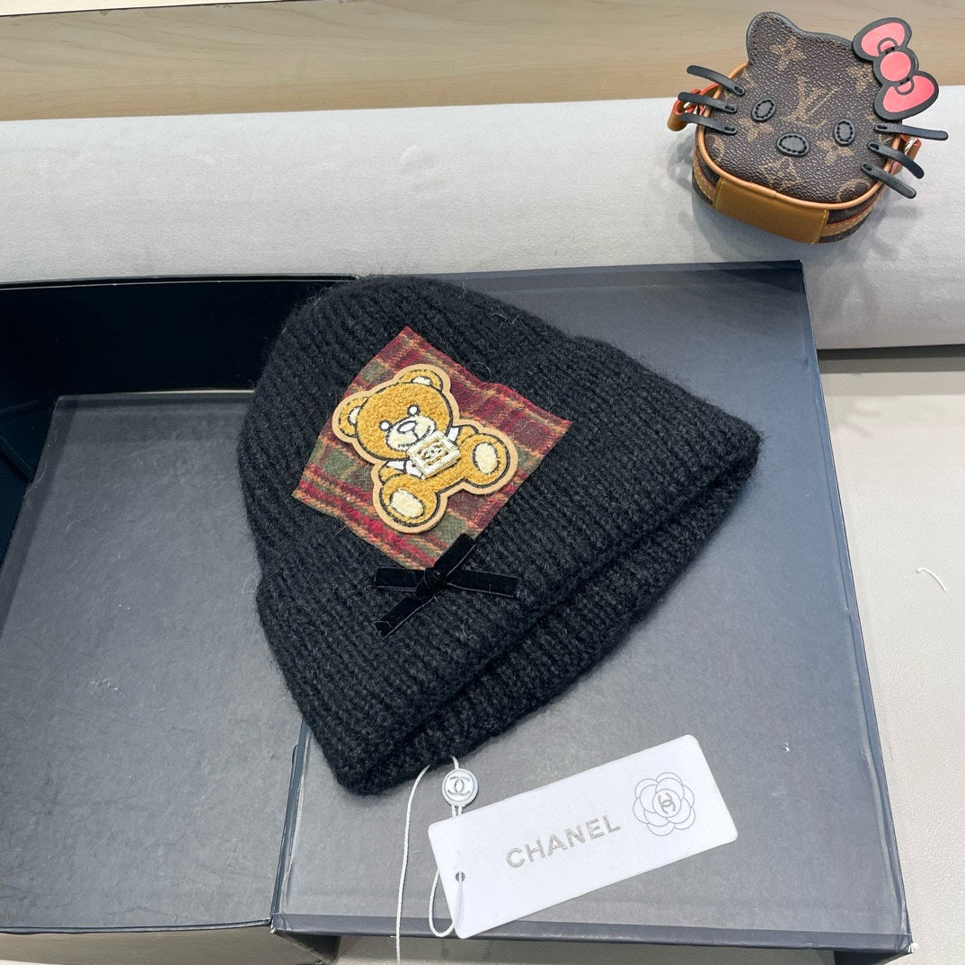 BEANIE HAT IN BLACK WOOL WITH BOW 421254