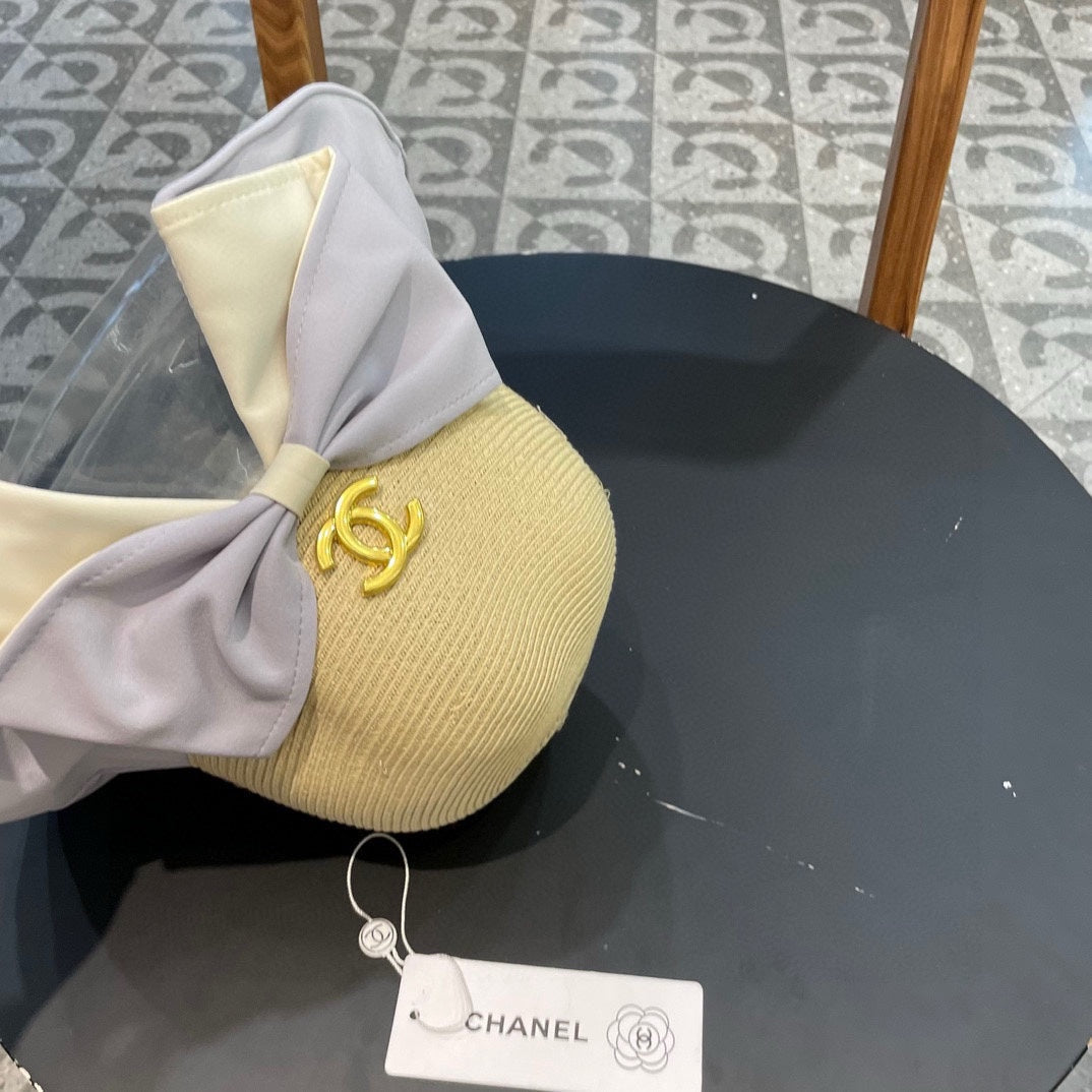 BOW BUCKET HAT IN PALE PURPLE MIX BEIGE RAFFIA 426169