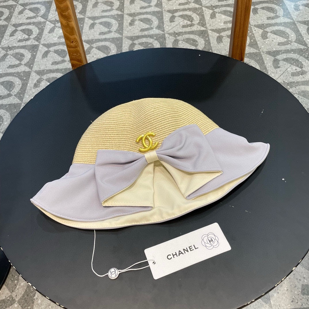 BOW BUCKET HAT IN PALE PURPLE MIX BEIGE RAFFIA 426169