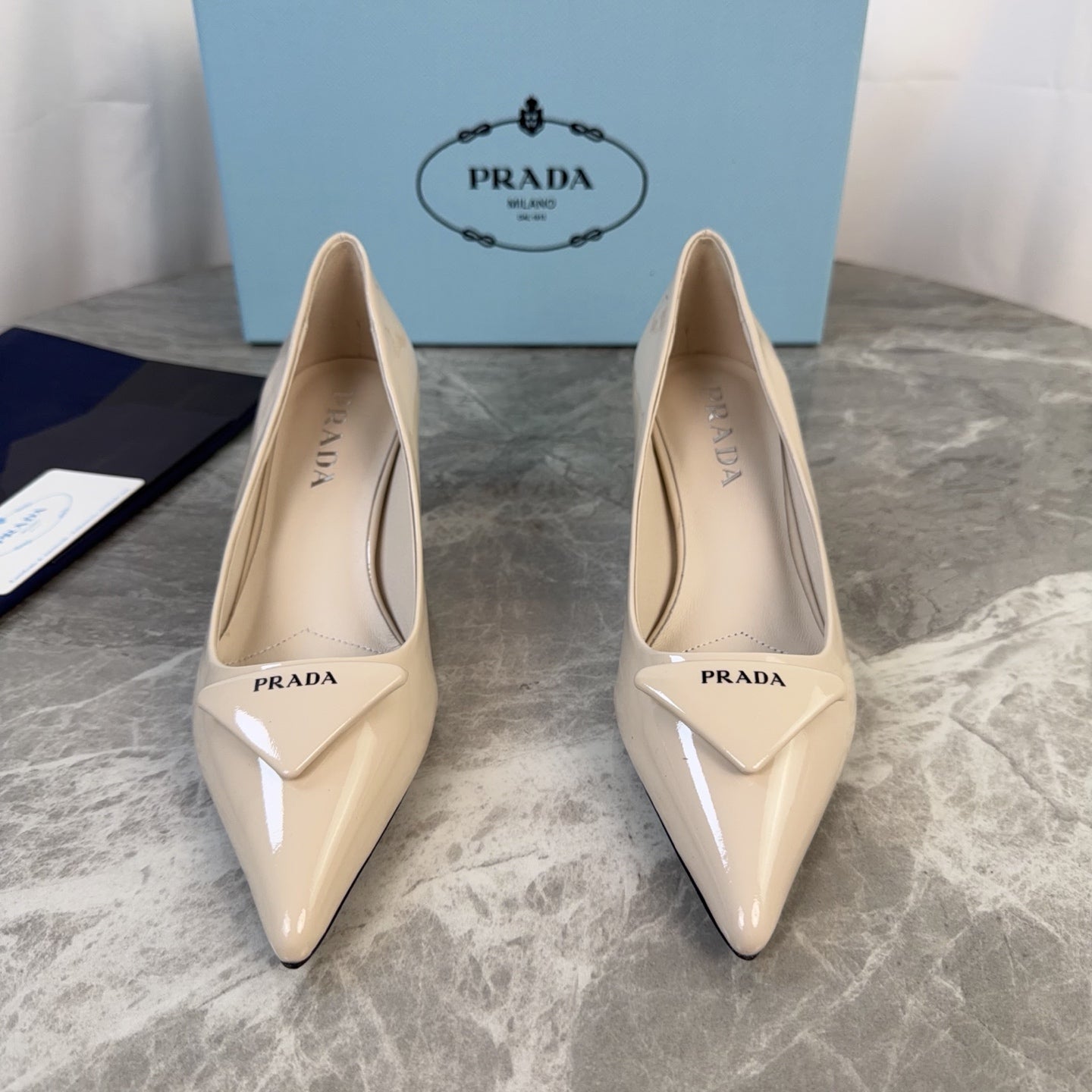 PRADA 25S POINTED-TOE HIGH HEELS 55 MM IN BEIGE GLOSSY LAMBSKIN