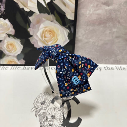 HAIRBAND IN NAVY BLUE FLORAL FABRIC 385854